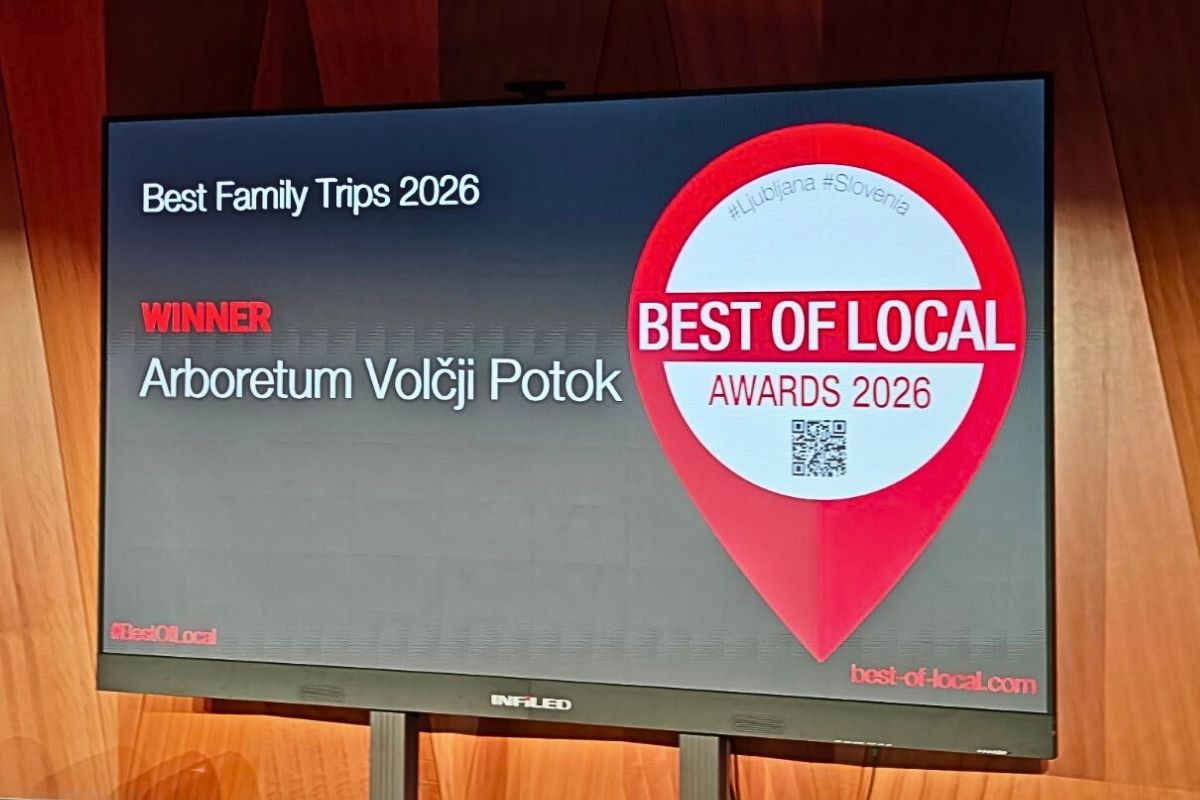 Zaslon z napisom Best Family Trips 2026 in oznako Winner Arboretum Volčji Potok ter logotipom Best of Local Awards 2026.
